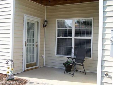 Exterior Back. Private back patio...also back entrance.