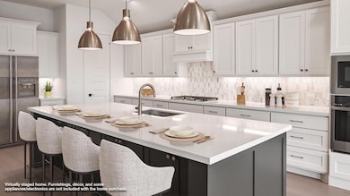 Kitchen with appliances with stainless steel fini