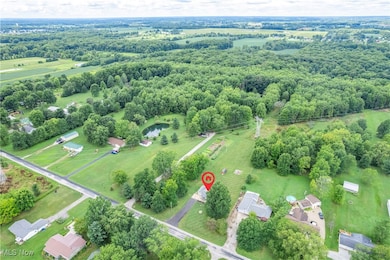 Aerial view of property's location featuring rural landscape