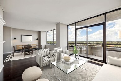 Engineered hardwood floors and a private balcony.