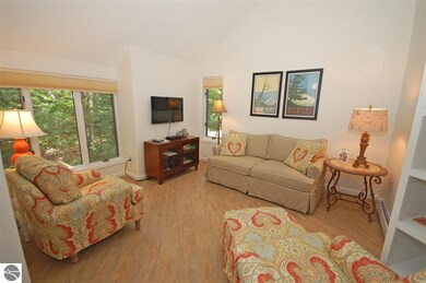 The cheery, bright, and well appointed living room