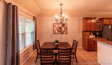 Spacious dining space overlooks the pergola patio.