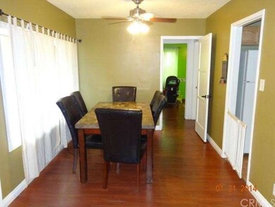 VIEW OF DINING AREA AND LAMINATE FLOORING 