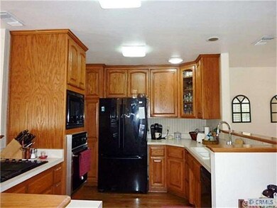 Larger, updated kitchen with lots of cabinets and 