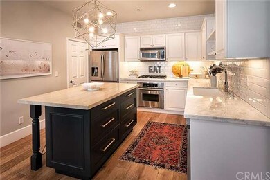 Custom island with hickory top and designer chande