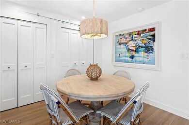 Dining room with baseboards, light wood finished f