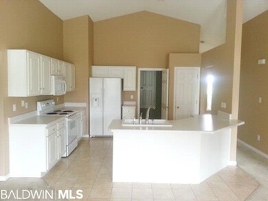 Living Room and Kitchen with Vaulted Ceilings
