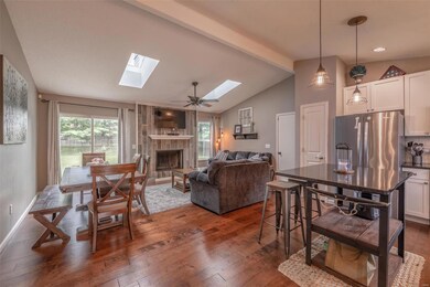 You will love the vaulted ceilings and the open fe