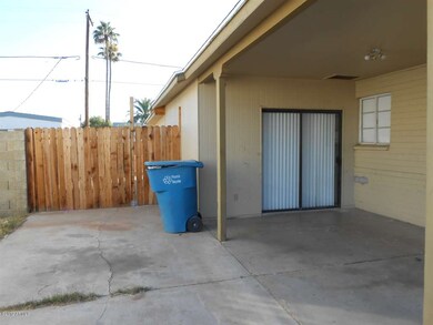 East Side View of  Carport & RV Gates
