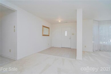 Foyer features ceramic tile flooring and open view