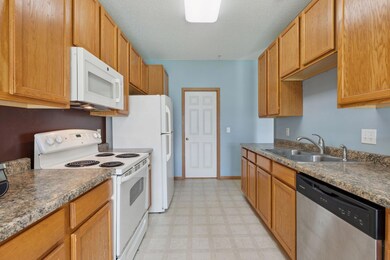 Clean, functional cooking space with room to move and plenty of storage
