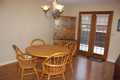 Dining Room w/Lam Floors & Private Deck