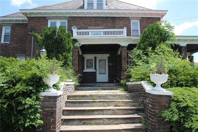 beautiful original front porch  with balcony above