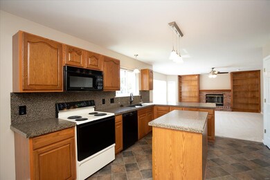 Kitchen with Granite Countertops and Center Island