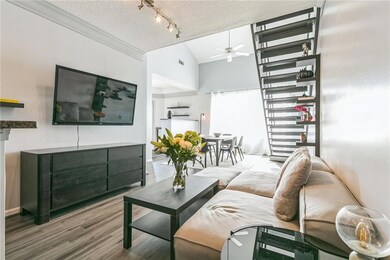 Living room with ceiling fan, hardwood / wood-styl