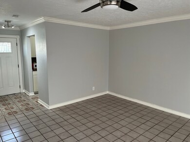 dining space in far corner, adjacent to kitchen.