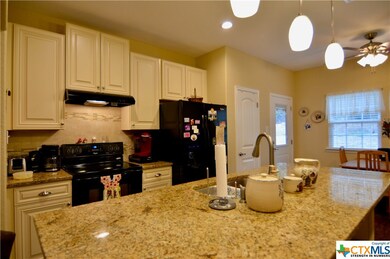 Granite countertops, oversized island, and full appliance package!