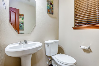 1/2 bathroom conveniently on the 1st floor for guests.