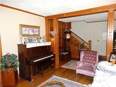 Main Floor Living Room with View of Entry Foyer