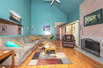 Family room with vaulted ceiling includes a cozy g