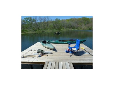 9 acre lake with fishing dock and swim platform
