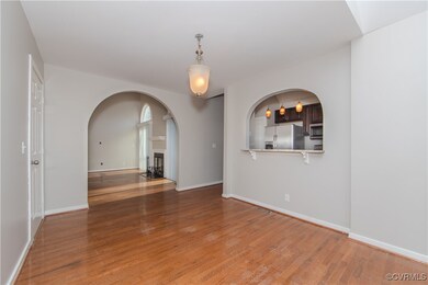 Unfurnished room featuring wood-type flooring