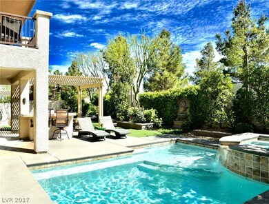 Lush backyard with sparkling pool and spa!
