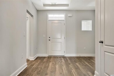 Large open foyer with trey ceiling