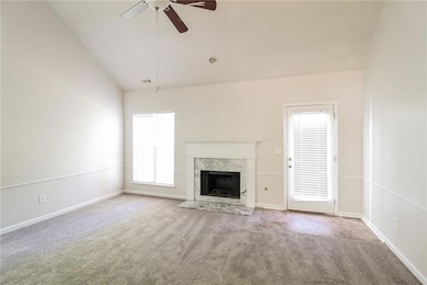 Unfurnished living room featuring a high end firep