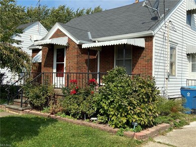 Cute front porch, and within the door is a foyer w