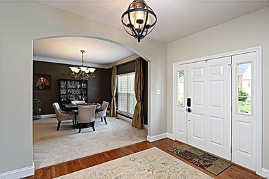 Entry looking right to the Formal Dining Room, cla