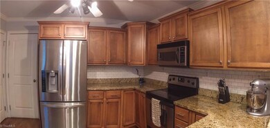 Kitchen with garage access and pantry.