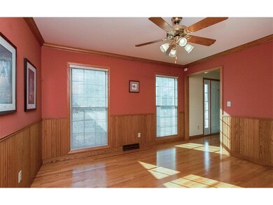 Formal dining room. Bright and sunny and with hard