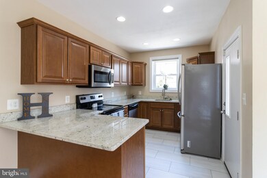 926 E 37th St, Baltimore, MD 21218 - photo 3