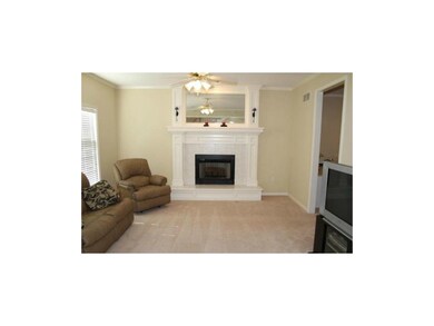 LIVING ROOM WITH FIREPLACE.