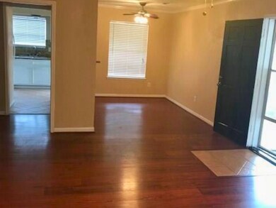 Spacious and inviting with warm wood floors, natur