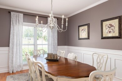 Notice the new chandelier and the wainscoting