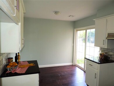 Eating area off the kitchen with patio access.