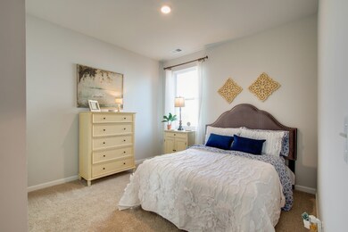 Full size or queen size bed would fit in this bedroom