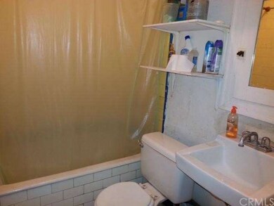 Studio bathroom down stairs unit.