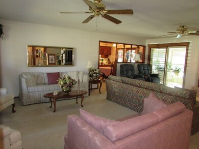 This living room is open and spacious!  There are 