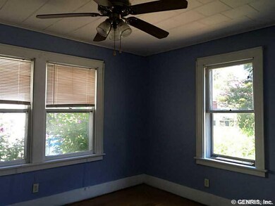 Dining Room. Ceiling fan assures comfort during me