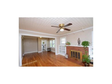 Family room has built-in bookshelves.
