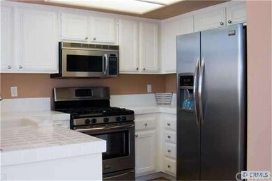Open kitchen, lots of cupboards, new stove, refrig