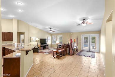 Welcoming entry opens to a spacious living area wi