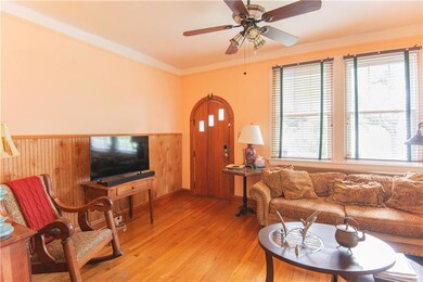 Front room with sunroom to the right