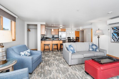 Living room featuring a wall unit AC