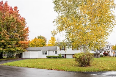 Lot has mature trees and easy maintenance landscaping for added interest.