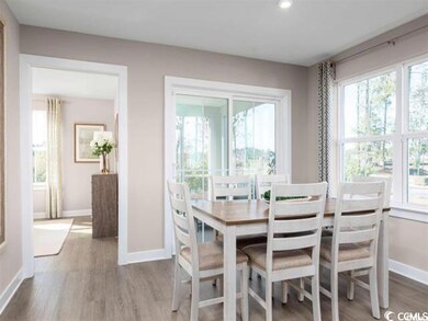 Dining room with wood-type flooring