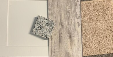 carpet color, LVP plank flooring, granite, and cab